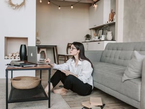 woman sitting on computer